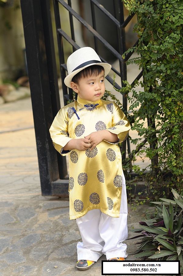 Áo dài trẻ em - Gấm Thái Tuấn màu vàng đồng 